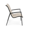 Side view of Skyline padded sling commercial patio dining chair with Starlight Black aluminum frame and Cane Oyster padded sling fabric