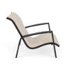 Side view of Skyline stackable padded sling commercial patio sand chair with Starlight Black aluminum frame and Cane Oyster padded sling seat and back