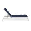 Side view of Urban Pointe padded sling commercial chaise lounge with Sky White aluminum frame, Dupione Sapphire padded sling, and adjustable back