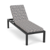 Coastal cushioned commercial patio chaise lounge with Starlight Black aluminum frame, Kindle Indigo patterned cushions, and adjustable back