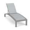 Coastal Pointe sling commercial chaise lounge with neutral gray frame, Interlock Calypso sling fabric, curved profile, and adjustable backrest