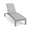 Coastal Pointe padded sling commercial chaise lounge with neutral gray frame, Interlock Calypso padded sling, curved profile, and adjustable backrest